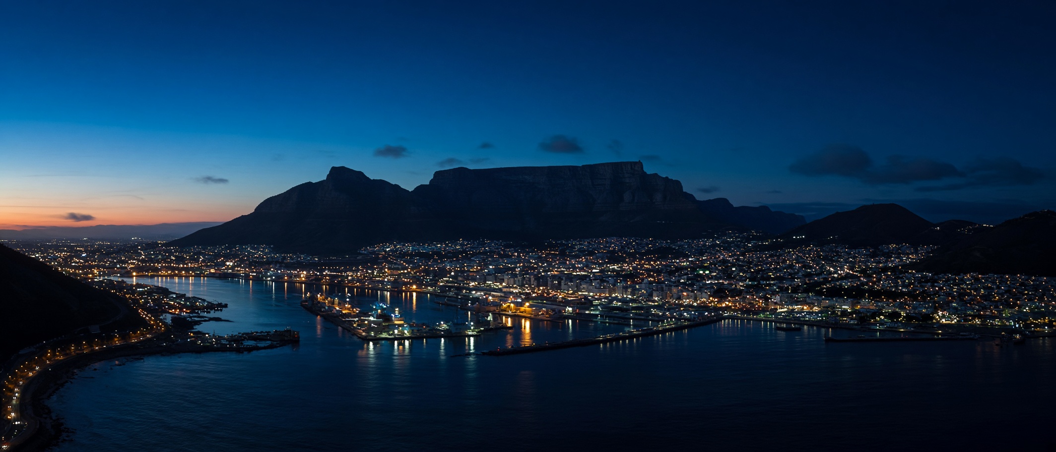 Cape Town harbour and Table Mountain at dusk